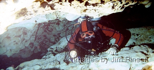  Diver goes through "The Lips" in the Devil's Eye cave system at Gennie Springs Florida.March 30, 1980.