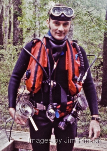  Jim Pinson in cave dive gear circa 1980.Gear included twin 80 cf aluminum tanks, ScubaPro stab-jacket and 7.5 volt wet cell nicad battery in PVC case powering 6 volt car headlamp.