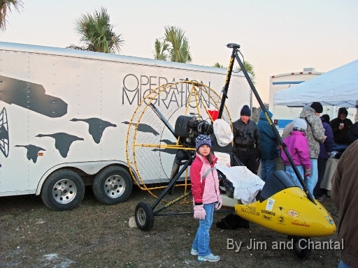  Youngster awaits historic Whooping Crane flyover in St. Mark's, Florida on a frigid January 17, 2009. About 2000 people celebrated the arrival of 7 young Whooping Cranes being led south from Necedah, Wisconsin by Operation Migration pilots.  The 1113-mile journey to St. Mark's took 82 days.  The goal is to reestablish an eastern migratory population of wild Whooping Cranes. Details at www.operationmigration.org