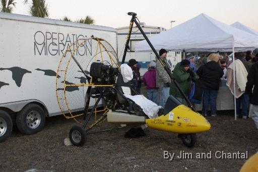  Ultralight aircraft exhibited beside Operation Migration (OM) equipment trailer.  Each autumn since 2001, young Whooping Cranes follow OM ultralights to learn the migration path from Wisconsin to winter habitat in Florida.  Whooping Crane flyover, St. Mark's, Florida, January 17, 2009.