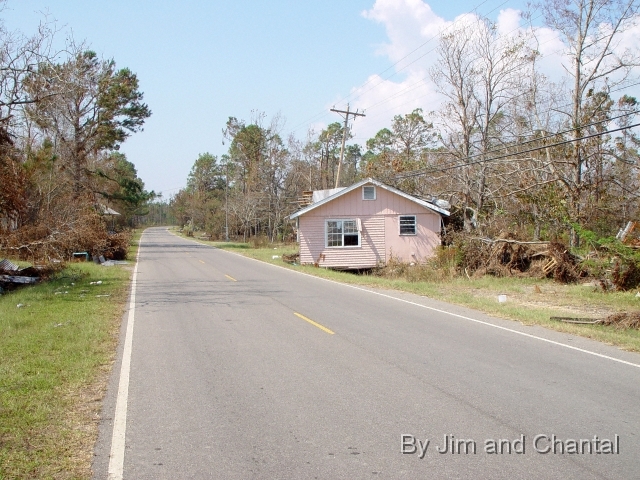  Surge relocated home to roadside, west of Waveland, MS.