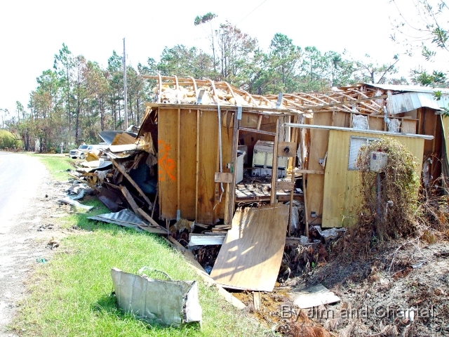  Damaged home west of Waveland, MS.