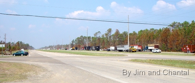  Trucks await orders along US-90 west of Waveland, MS.