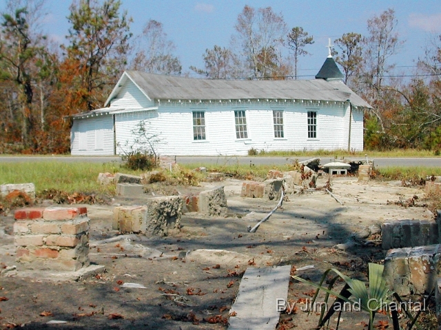  Church moved off foundation (foreground) and ended up across road.